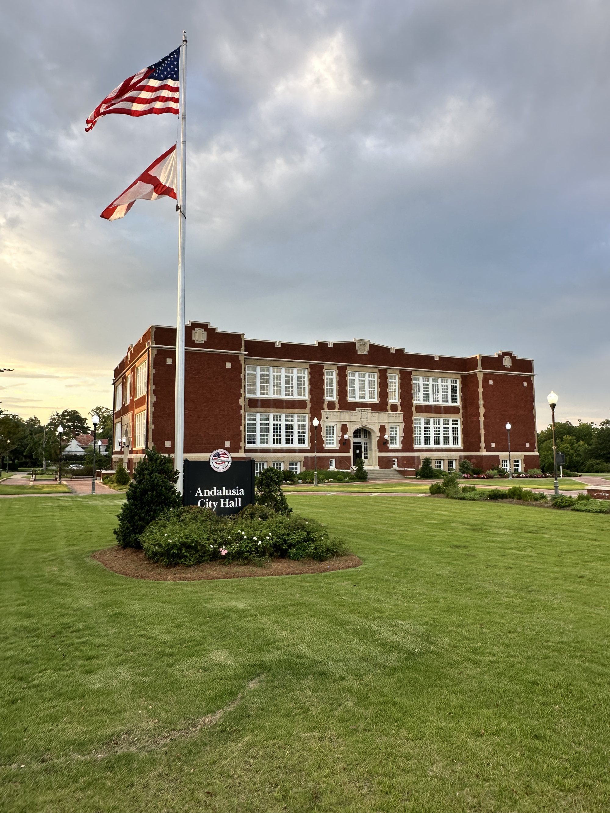Andalusia City Hall, the former East Three Notch School, flying the U.S. and Alabama flags